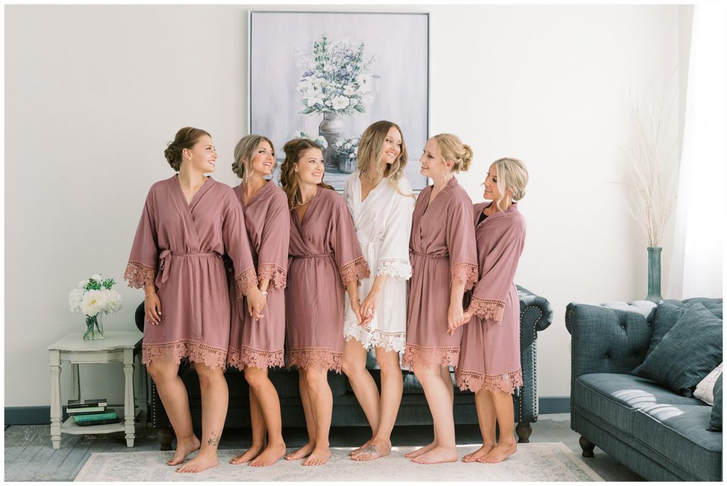 Bridesmaids in pink robes